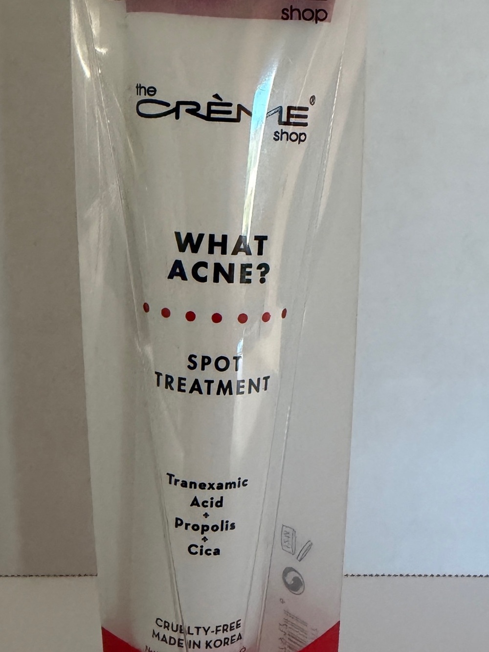 The Crème Shop What Acne? Spot Treatment — White with Red Accents